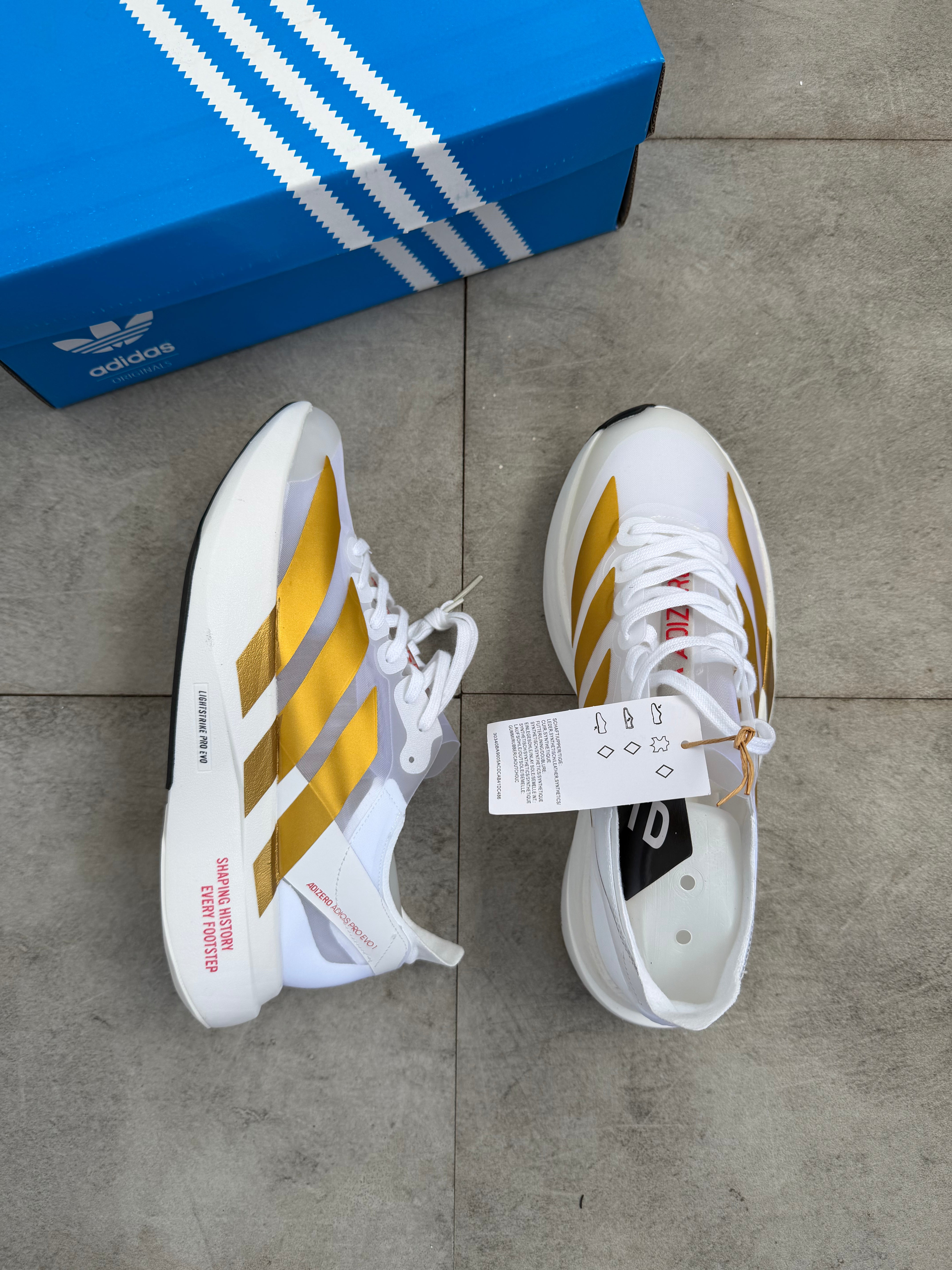 Adidas Adizero Adios Pro 4 – Cloud White / Gold Metallic