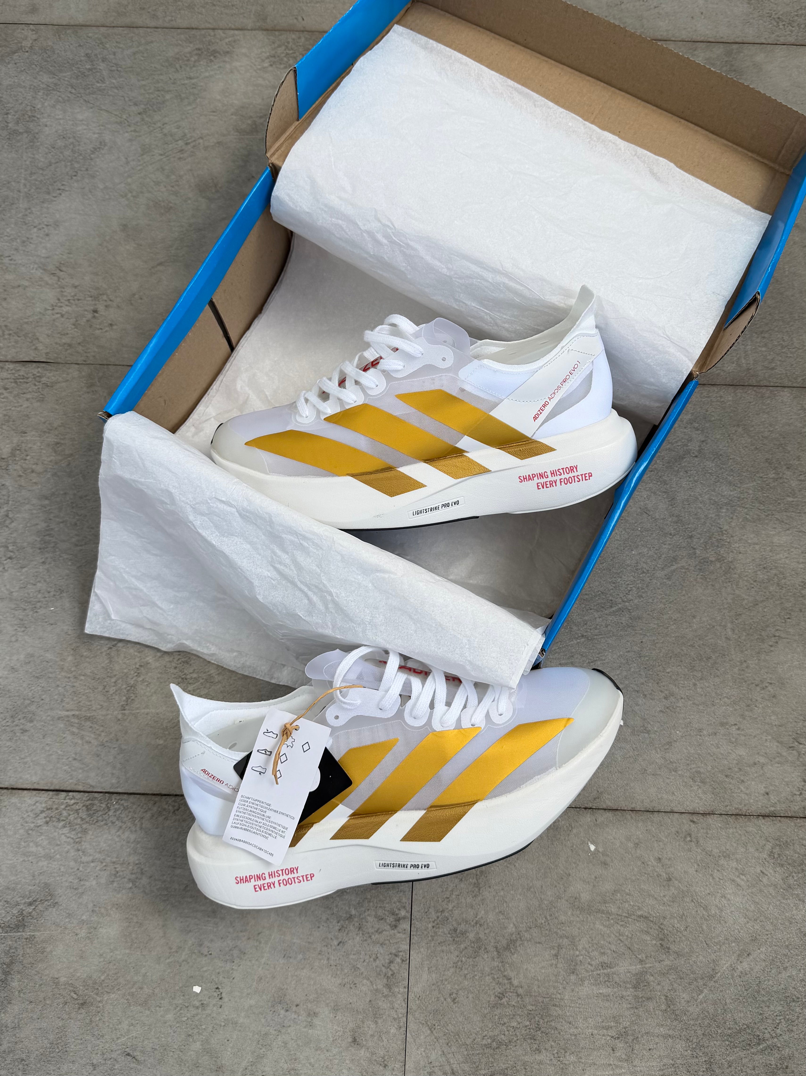 Adidas Adizero Adios Pro 4 – Cloud White / Gold Metallic