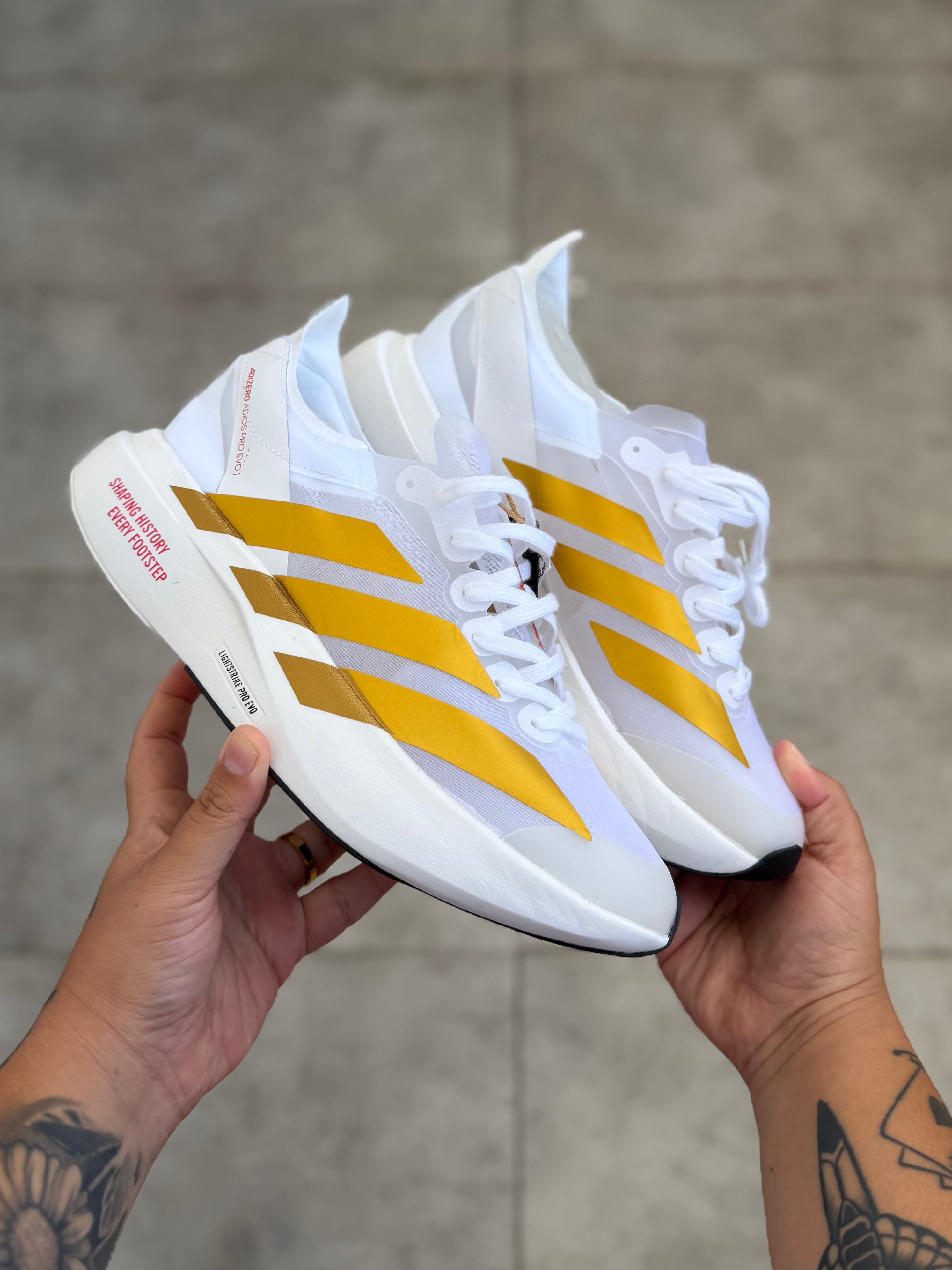 Adidas Adizero Adios Pro 4 – Cloud White / Gold Metallic