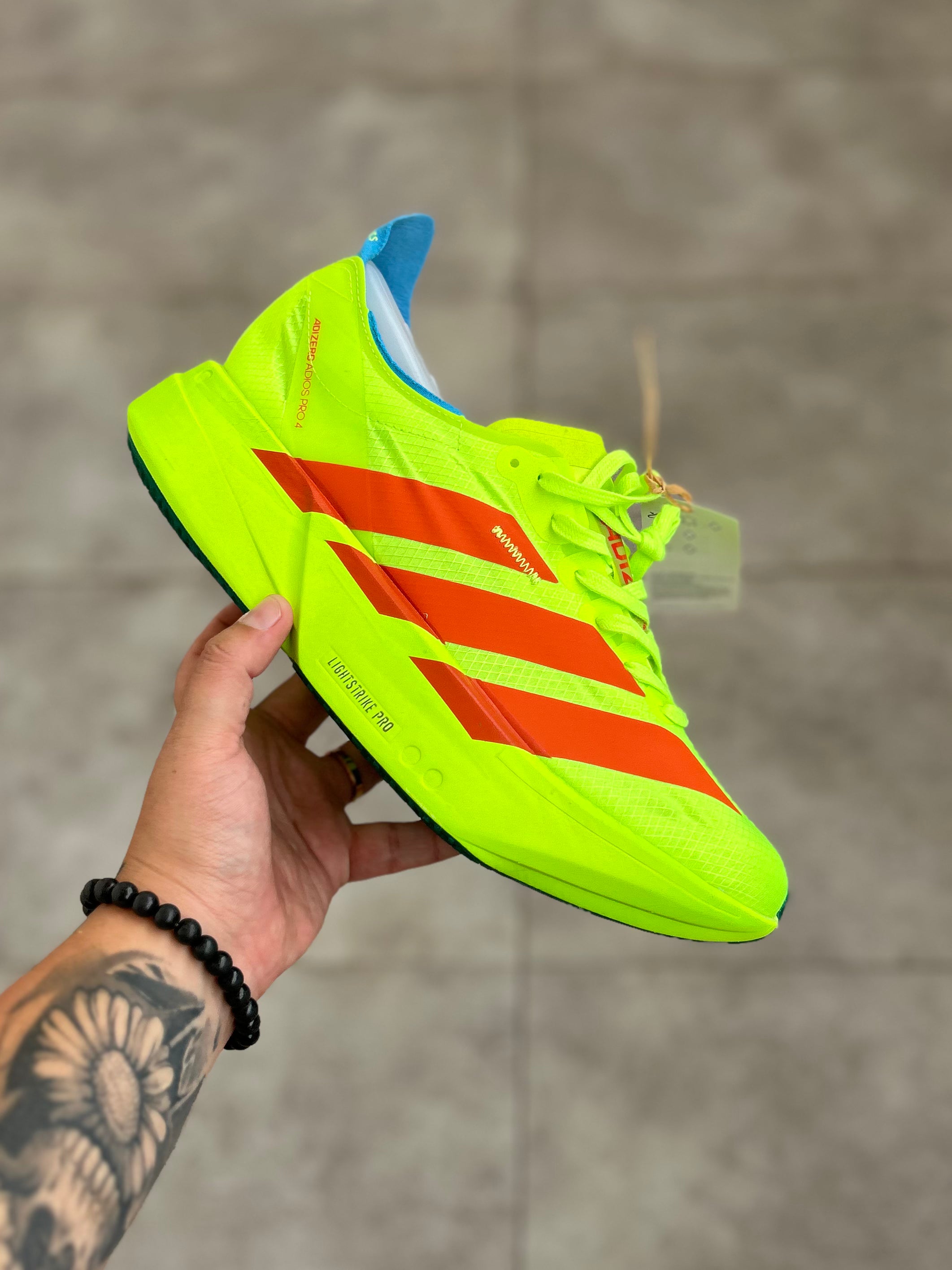 Adidas Adizero Adios Pro 4 – Lucid Lemon / Lucid Red / Blue Spark