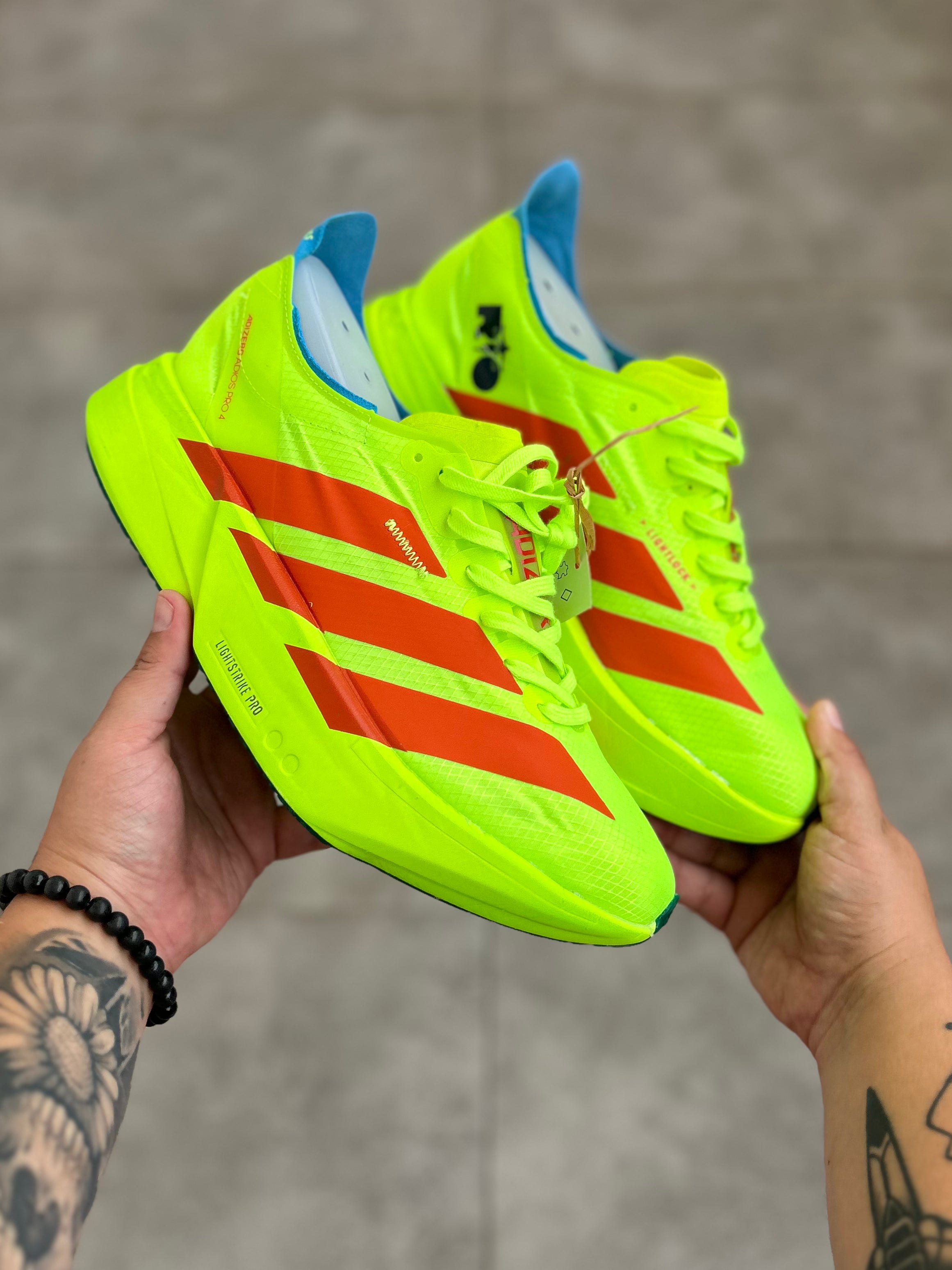 Adidas Adizero Adios Pro 4 – Lucid Lemon / Lucid Red / Blue Spark
