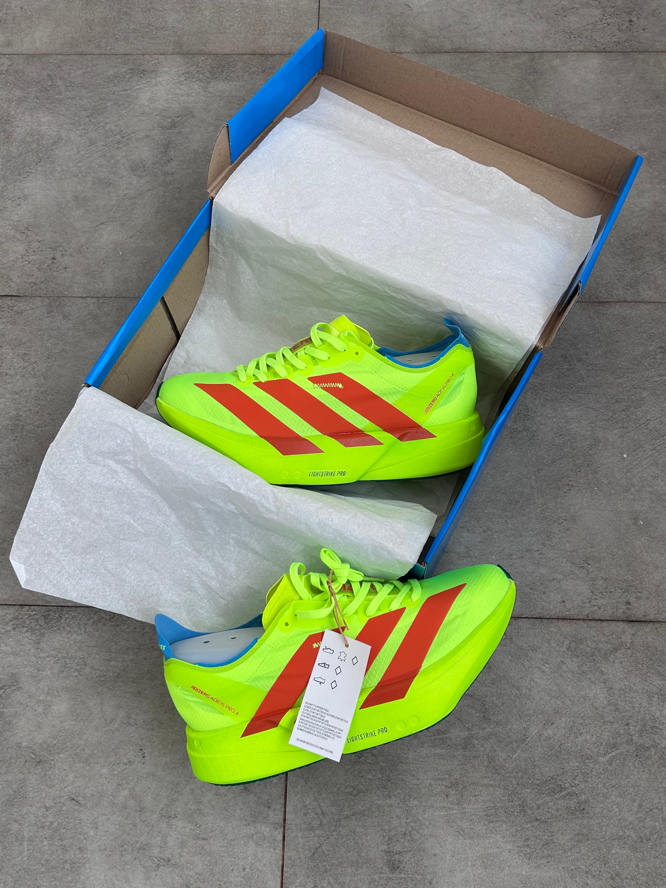 Adidas Adizero Adios Pro 4 – Lucid Lemon / Lucid Red / Blue Spark