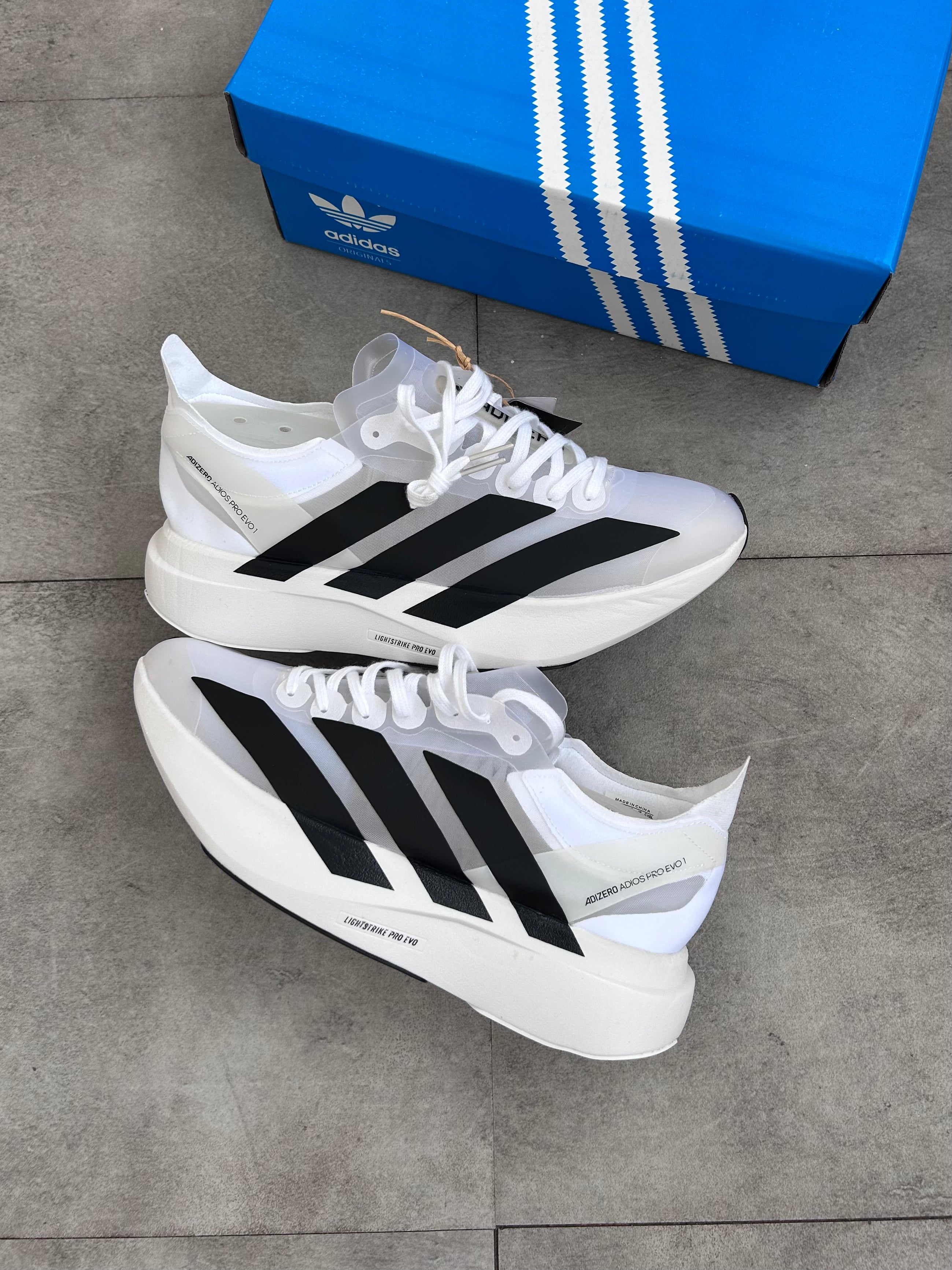Adidas Adizero Adios Pro 4 – Cloud White / Core Black